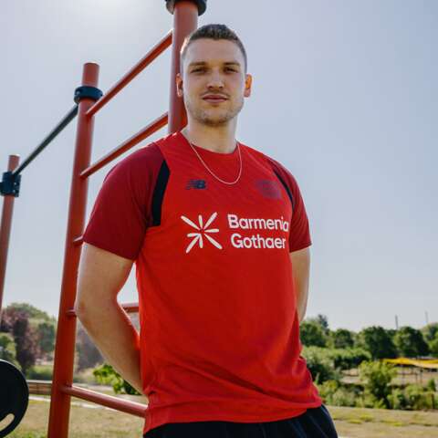Model wears training shirt