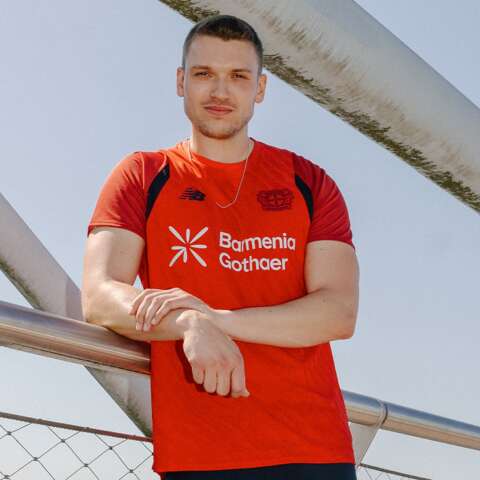 Model wears training shirt