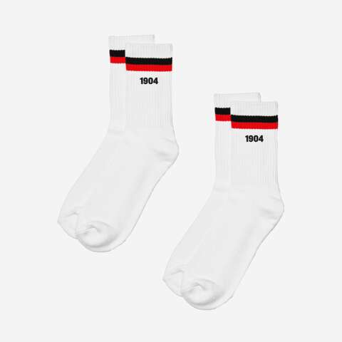 Set of 2 tennis socks made from 74% cotton, 16% polyester, 8% polyamide, and 2% elastane, for 12.90€. Sizes: 39-42, 43-46. With 1904 lettering on both sides of the shaft.