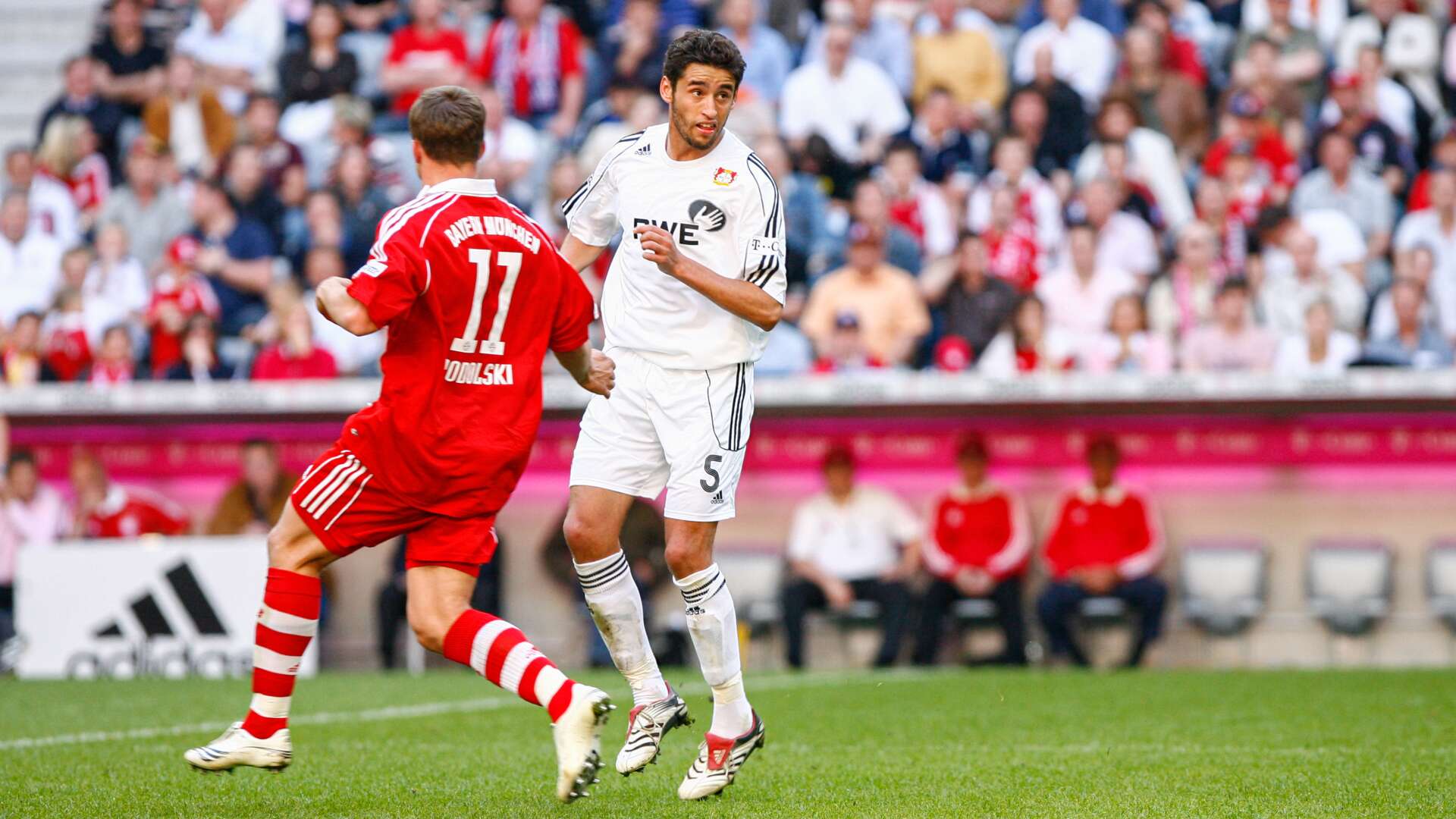 Karim Haggui und Lukas Podolski