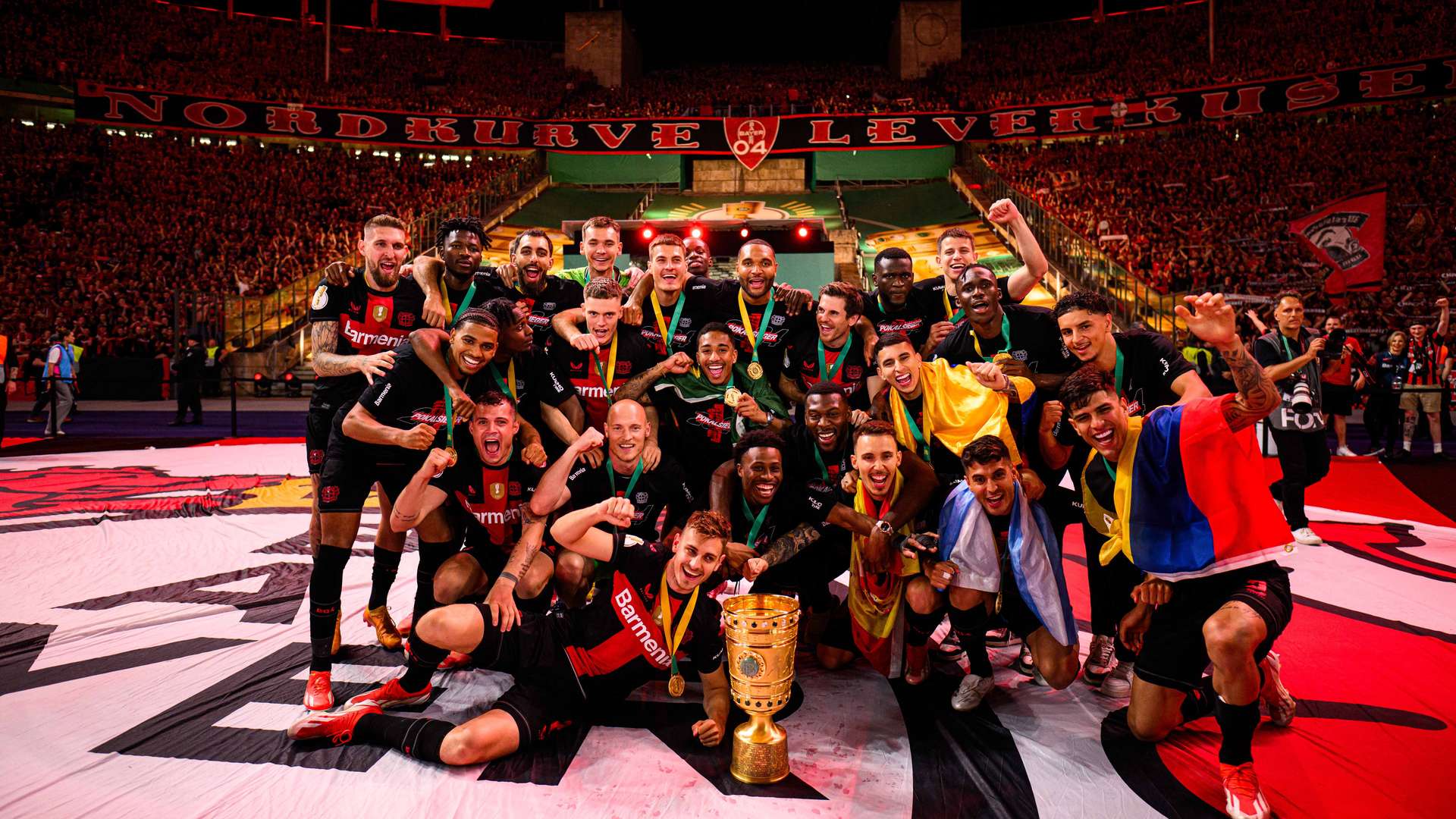 Team photo with the trophy