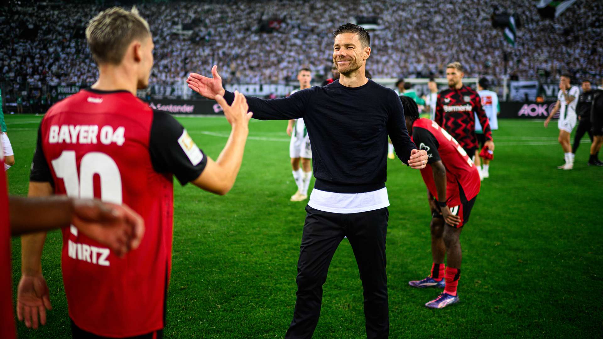 Xabi Alonso mit Florian Wirtz